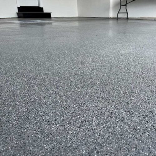 Gray flake epoxy coated garage floor