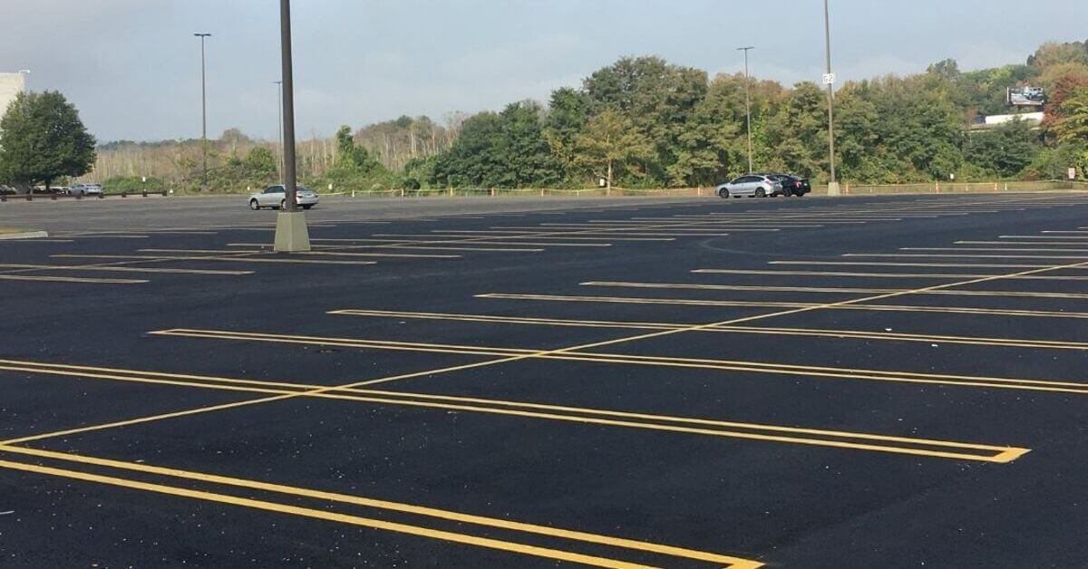 Freshly sealcoated and line-striped commercial parking lot in New Jersey